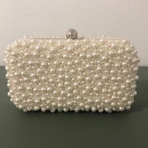 I purchased to gift it, but found a better clutch to match the bride’s dress.
